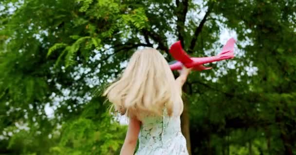 Handheld Shot Low Angle Charming Blond Preteen Girl White Dress — Stock Video