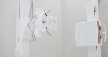 Study of the human body. Modern technologies in medicine. X-ray machine in lying and standing position. Hospital Radiology Room. Scanning for Fractures, Broken Limbs, Injuries, Cancer or Tumor.