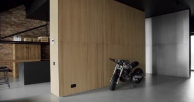 Modern contemporary Minimalist living room with wooden wall and Sports motorcycle. Luxury Modern House Interior. Minimalist Home Interior. Cozy Modern Furniture Design. Luxury Elegant Room.