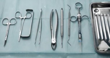 Sterile instruments at the dental clinic. tools for tooth treatment. instruments for examining teeth on the dentists table. Sterile instruments in a modern dental clinic for tooth extraction