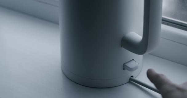 Mans Hand Presses Button Electric Kettle Turn Water Boils Button — Video