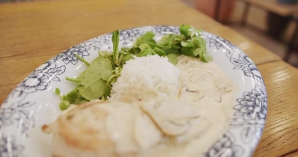 Chicken Fillet Mushroom Sauce Rice Salad Leaves Served Plate Modern — Stock video
