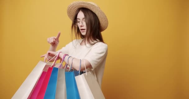 Female Shopaholic Colorful Paper Bags Static Shot Happy Young Woman — Vídeos de Stock