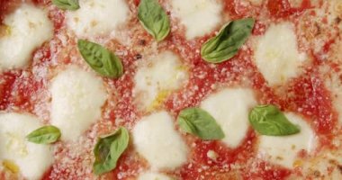 Pizza Margherita. Italian cuisine. Neapolitan Margherita Pizza, Margherita Pizza Topped with Melted Mozzarella Cheese. Fresh Delicious Food. Organic Cuisine. Restaurant Pizza Food.