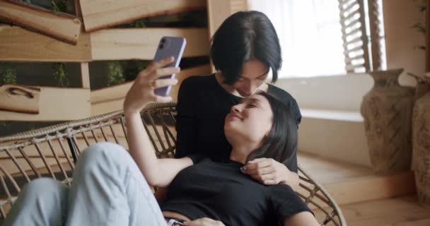 Low Angle Handheld Shot Young Lesbian Couple Smiling Touching Hands — Stock video