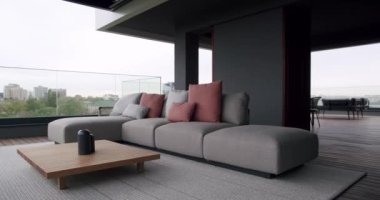 Modern real terrace, in luxury house with beautiful furniture and sliding door, Modern real apartment with sliding door, beautiful furniture. Minimalist modern black gray and white design interior.