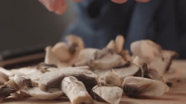 Young Chef Restaurant Uniform Works Kitchen Holds Mushrooms His Hand — Stock Video