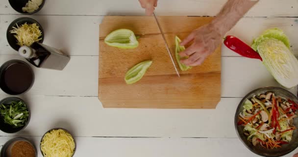 Static Shot Slow Motion Faceless Chef Cutting Green Pepper Board — Video Stock