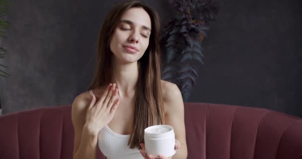 Beautiful Woman Applying Cream Hand Skin Young Woman Treating Neck — Stock Video