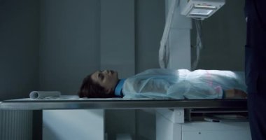 Study of the human body. Modern technologies in medicine. X-ray machine in lying and standing position. Hospital Radiology Room. Scanning for Fractures, Broken Limbs, Injuries, Cancer or Tumor.