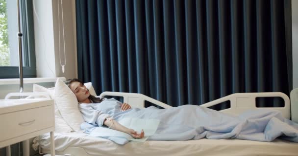Female Patient Hospital Bed View Young Ill Woman Long Dark — Video Stock