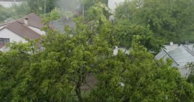 Torrential Rainstorm With Hail In Urban Residential Street Raining Ice Storm, Torrential Hailstone Rain on Window, Inundation, Flooding, Rainfall, Natural Calamity Disaster Heavy Rainy Day.
