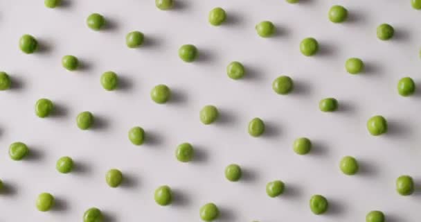 Fresh Green Peas Placed Side Side Rotate White Platform Raw — Stock video