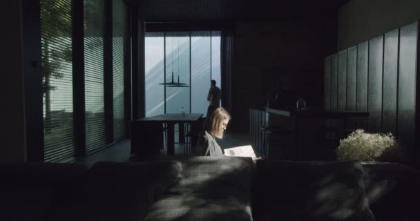 Man Open Glass Sliding Door Enter Modern Dark Room Woman — Stock Video