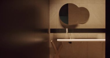 Otel banyosunda çağdaş bir iç mekan, düz lavabo, şelale musluğu ve duvarında yuvarlak ayna. Modern minimalist tarzda lavabosu ve musluğu olan lüks tuvaletler.