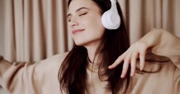 Mindful Young Happy Woman Wearing Wireless Headphones Listening Relaxing Music — Stockvideo