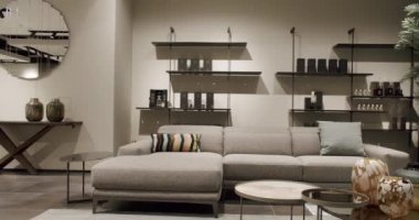 Modern contemporary Minimalist living room with gray furniture. Fashionable furniture. Minimalist Home Interior. Cozy Modern Furniture Design. Luxury Elegant Room. Real Estate private home.