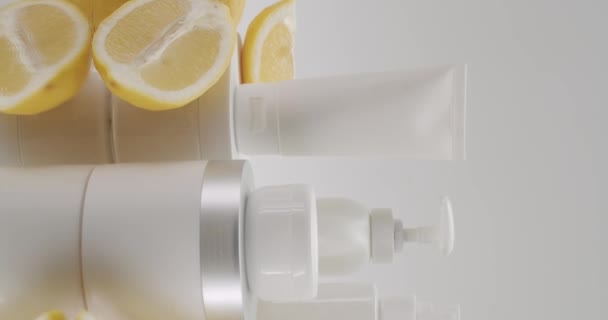 White Bottle Tubes Lemon Fruits Cosmetics White Background Studio Natural — Stock Video
