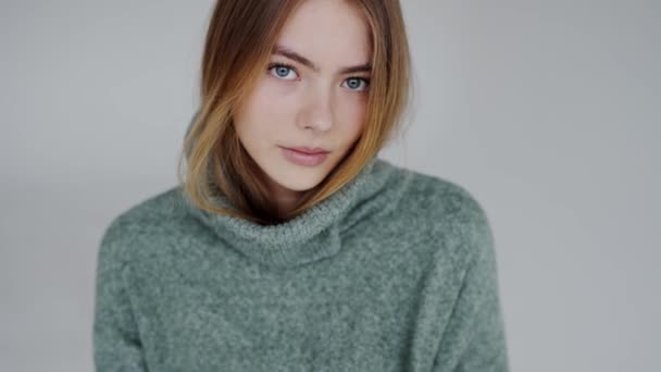 Woman Green Sweater Facing Camera Her Smile Revealing Delicate Eyelashes — Stock Video