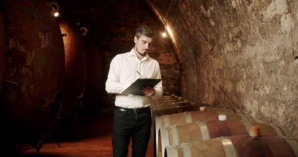 Sommelier Checking Quality Beverage Distillation Process Wine Cellar Alcohol Drink — Stock Video