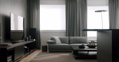 Oturma odasının çekmeceli televizyon sandıklı modern iç tasarımı. Basit tuvaleti olan modern bir oturma odası. Lüks Zarif Oda. Minimalist İç İşleri. Konforlu Modern Mobilya Tasarımı.