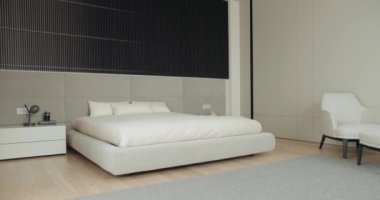 Zarif bir şekilde tasarlanmış minimalist yatak odası lüks bir yatak odası, rahat bir koltuk ve ahenkli bir renk paleti. Modern ev dekorasyonu fikirleri için mükemmel. Modern Minimalist Yatak Odası İçi