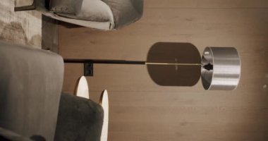 Gri mobilyaları ve tahta duvarları olan modern Minimalist oturma odası. Moda mobilyalar. Minimalist İç İşleri. Lüks Zarif Oda. Gayrimenkul özel evi. Dikey video.