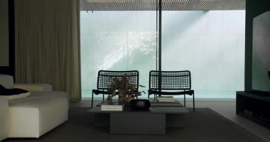 Minimalist mobilyalar, büyük pencereler ve dingin renk paleti olan zarif modern oturma odası. Tasarım ilhamı için mükemmel. Zarif Minimalist Dekorlu Modern Oturma Odası