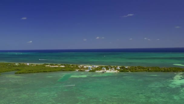 Drone Shot Split Lagoon Revealing Resorts Buildings Caye Caulker Island — 비디오