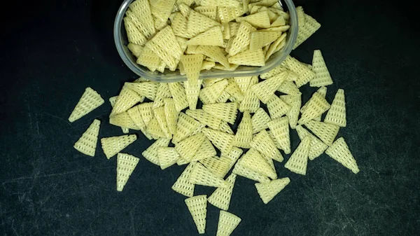 Triangle Shape Fryums Crunchy Snacks Black Background — Stock Photo, Image