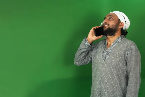 Young Indian Farmer Talking To Someone On His Mobile, Green Screen, Copy Space