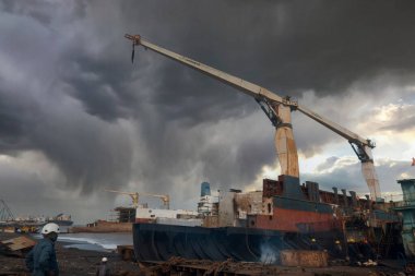 Alang, Bhavnagar, 31, August, 2024: Industrial maritime recycling is being conducted at the Alang Shipyard, where the dismantling of decommissioned vessels is actively occurring clipart