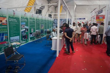 Rajkot, Gujarat, India. 27th September, 2024. Side view of Paschim Gujarat Vij stall, Rajkot Machine Tools Show 2024. clipart