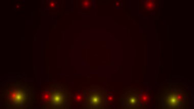 Bu videoda kırmızı ve sarı renk şeması ile siyah bir arkaplan tasvir edilir. Video kırmızı ve sarı noktalar içeriyor, parlıyor gibi görünüyor..