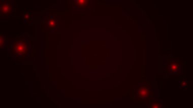 Ekranda birkaç küçük nokta bulunan kırmızı renkli bir video sunuluyor. Arkaplan siyah.