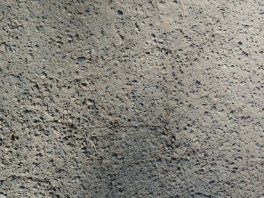 Eski gri asfalttan. Taş yol