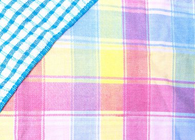 Different cloth fabrics textures colorful, backgrounds, top view and copyspace.