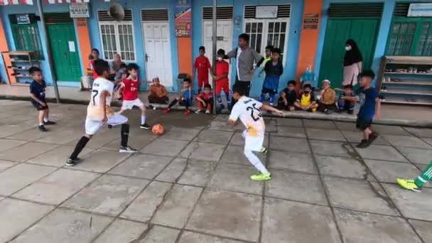 Asian Child Kicking Ball While Playing Soccer Young Asian Playing — Vídeo de Stock