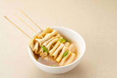 Odeng or Fish Cake Soup, Korean street food.  clipart