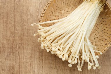 Enoki mushrooms (jamur enoki), an edible mushroom with a long white fruiting body like bean sprouts clipart