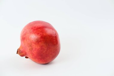 Fresh Pomegranate isolated on white background, copy space, selected focus. clipart