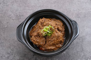 Rendang Daging Sapi, traditional food from Padang, Indonesia clipart