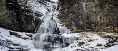 Frozen Devil's Waterfall on Alpe Devero Italy clipart