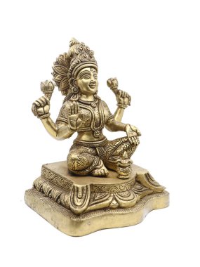 Hindu tanrıçasının el yapımı pirinç putu müshil birden fazla kolla bağlanıyor, zenginliğin ve refahın sembolü beyaz bir arka planda izole edilmiş