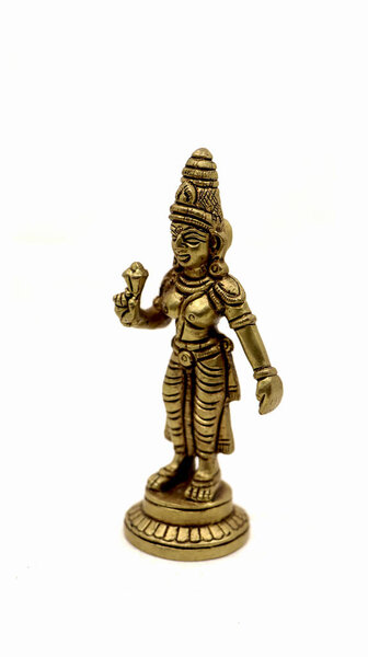 antique Indian bronze statue of a deity isolated on white background