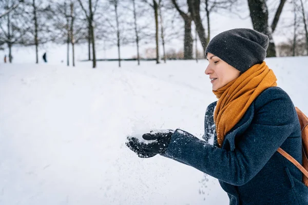 Woman Warm Clothes Throws Snow Her Hands — Stock Photo, Image