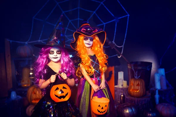 Two Kid Girls Witches Carnival Costume Holding Pumpkins Candies Halloweenparty — Foto de Stock
