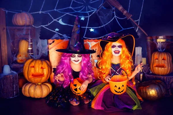 Two Little Girls Witches Carnival Costume Scaring Making Faces Background — Photo