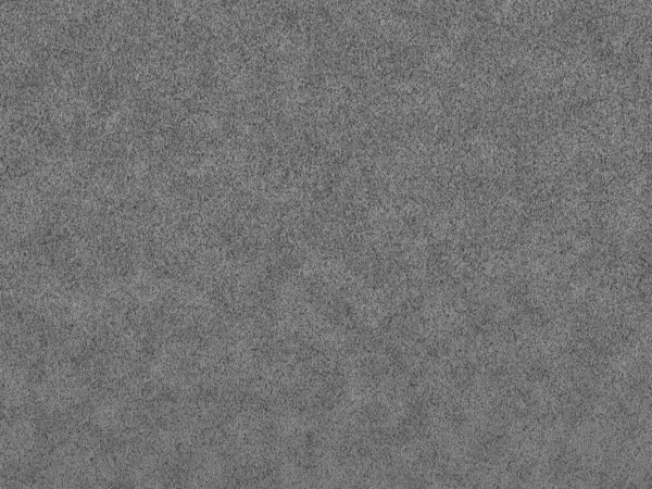 stock image A realistic dark gray concrete texture backgrounds. featuring a stone wall with a grainy noise effect. The soft, faded, and clouded look adds depth and an industrial feel to any design.