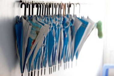 Rainy season. Umbrellas.  La Vang. Vietnam. 